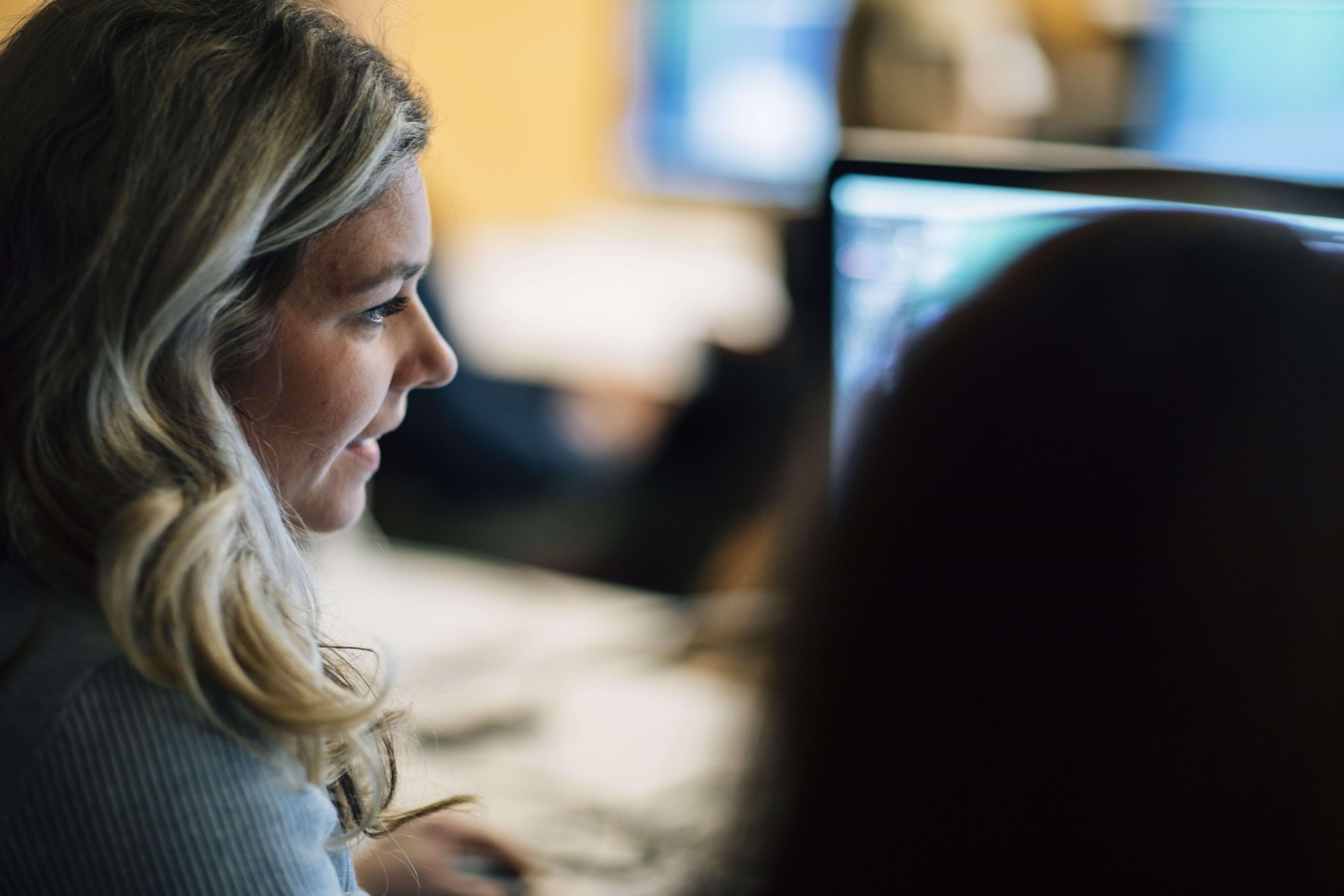 Female student looking at computer screen